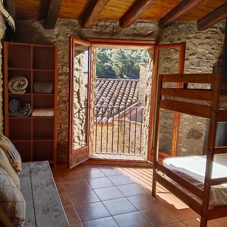 El Refugi Hostel Arboli Luaran gambar