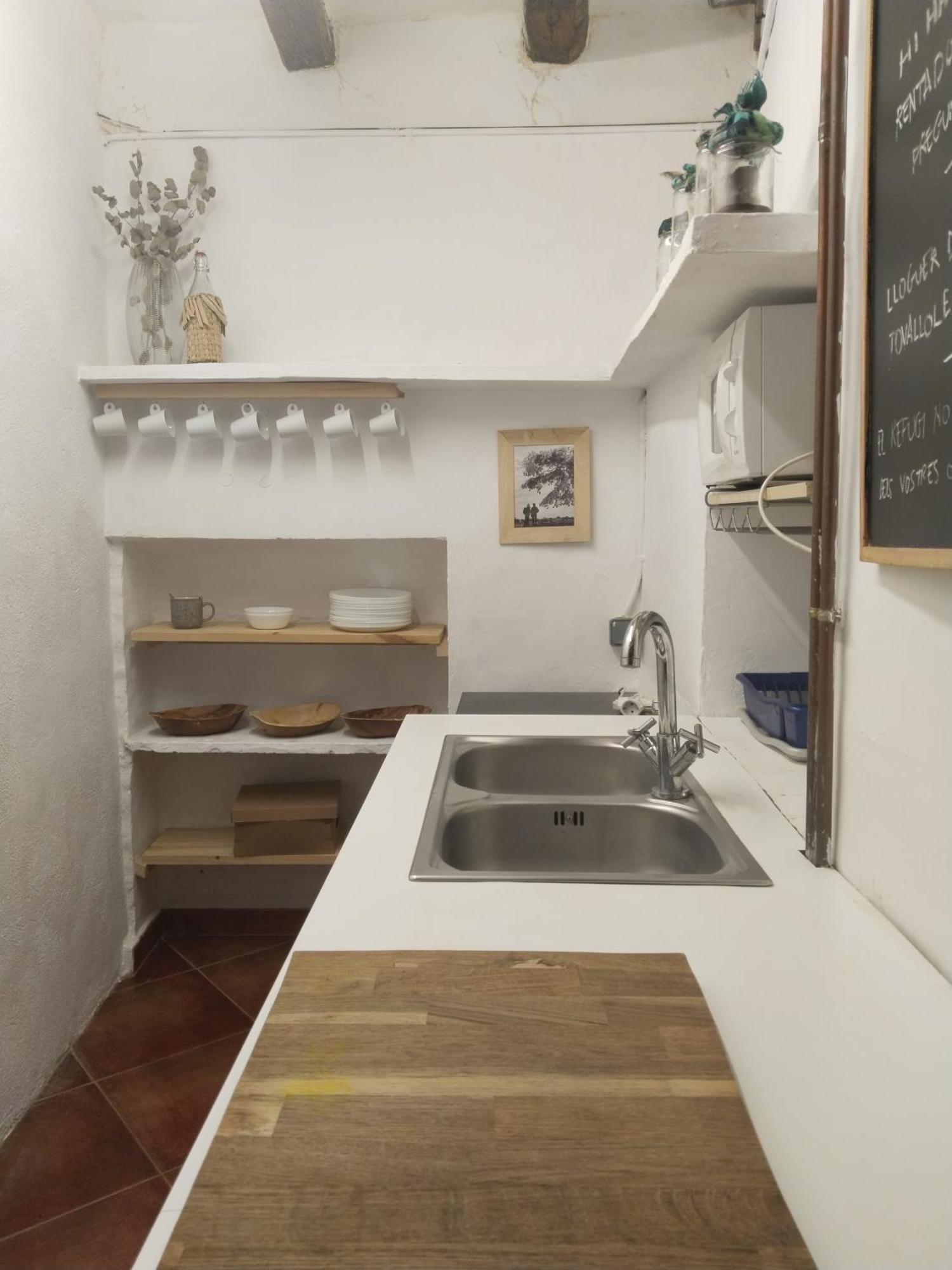 El Refugi Hostel Arboli Luaran gambar